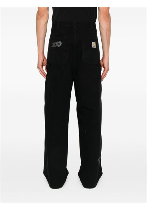 pantaloni og single knee graphic uomo neri CARHARTT WIP | I03556089.60